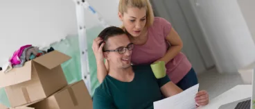 couple moving looking at financing
